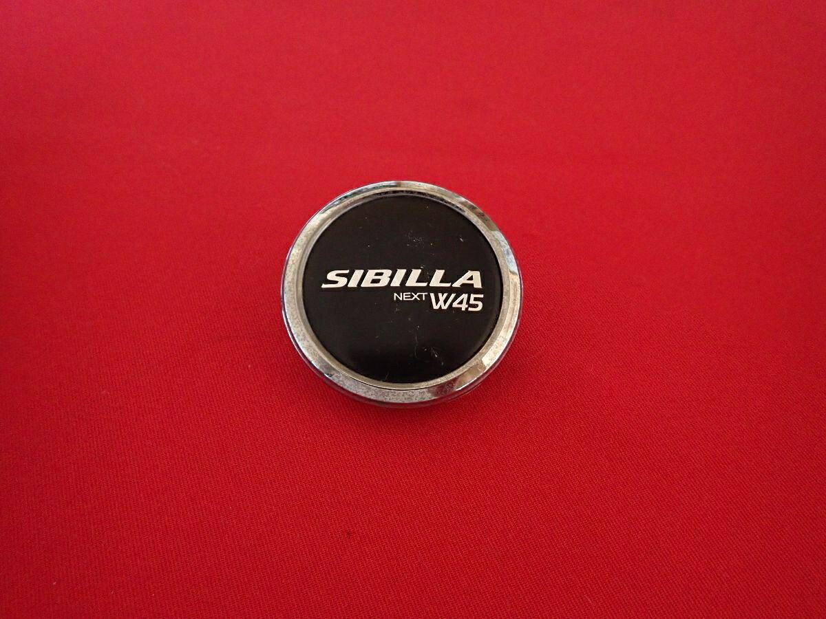 ●商品情報 SIBILLA NEXT W45 中古センターキャップ1枚の出品です。全体的にキズ、変色またはくすみがあります。プラスチック製、メッキ色×黒色です。刻印 MG-P1661HHB-2☆キャップを傷つけてしまった方、破損してしまった方、いつの間にか知らないうちに飛んで行って失くしてしまった方、経年劣化により使用出来なくなってしまった方など、単品でお探しの方におススメです！！☆【寸法・程度について】【程度について】キズ等の程度につきましては画像にてご確認ください。表記は省略させて頂いておりますのでご了解ください。【寸法】※すべて実測値です画像にてご確認下さい。測定個所は下記の部分となります。全幅(直径)・裏面取付部径・厚さ(高さ)ジャンクCP5206572 社外 キャップ 商品番号 P005206572 （お問い合わせの際にはこの番号をお伝え下さい） 部品名 キャップ 証明書 無 保証書 なし 取扱説明書 無 当店評価 ジャンクC スペック 送料（税別） 1,000円 ※沖縄県や離島の場合は中継料が加算されます 当店は中古専門店です。商品画像をよくご確認の上ご購入下さい。 お気に召しませんでしたか？ 当店には数万点の商品があります。 他の商品もぜひご検討ください。 この店舗の他の商品も見てみる