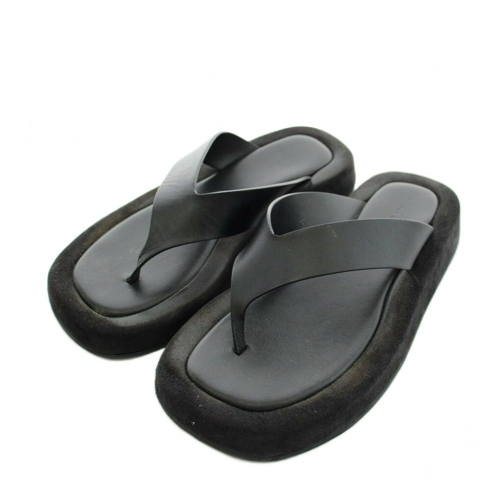 【中古】ザロウ THE ROW ギンザ Ginza トングサンダル レザー 35.5 黒 ブラック /AN67 レディース 【ベクトル 古着】 260709ブランドザロウ THE ROW表記サイズ35.5実寸サイズ最大幅：約11cm　アウトソール：約25cm　　素材レザー色黒 ブラック状態インソールに白い汚れがございますが、その他に目立ったダメージはなく、問題なくご使用いただける商品です。 ※あくまでも中古品ですので掲載写真や記載内容をご確認いただき、ご理解の上ご購入ください。付属品箱（ダメージあり）商品のお問い合わせの回答を休止しております。＊各商品ページの商品詳細等をご確認の上ご購入ください。【中古】ザロウ THE ROW ギンザ Ginza トングサンダル レザー 35.5 黒 ブラック /AN67 レディース 【ベクトル 古着】 260709状態ランク　”AB”詳細については、下記および「状態ランクについて」ページをご覧ください。未使用・新品の商品ほぼ新品同様の商品使用感が少なく、かなり状態の良い商品使用感はあるが、傷や汚れの少ない商品使用感の他、傷や汚れが見られる商品かなり大きな傷みがある難あり商品※S〜CランクはUSED品となりますので、使用感をご理解の上でご入札下さい。状態ランクについてinformationブランドザロウ THE ROW表記サイズ35.5実寸サイズ最大幅：約11cm　アウトソール：約25cm　　素材レザー色黒 ブラック状態インソールに白い汚れがございますが、その他に目立ったダメージはなく、問題なくご使用いただける商品です。 ※あくまでも中古品ですので掲載写真や記載内容をご確認いただき、ご理解の上ご購入ください。付属品箱（ダメージあり）商品のお問い合わせの回答を休止しております。＊各商品ページの商品詳細等をご確認の上ご購入ください。本商品は一点物です他サイトや店舗にて販売している商品です。多少のお時間差にて欠品になることもございます。予めご了承頂ますようお願い致します。ベクトル・サイズガイドはこちらこの商品と同じブランドの商品を見る