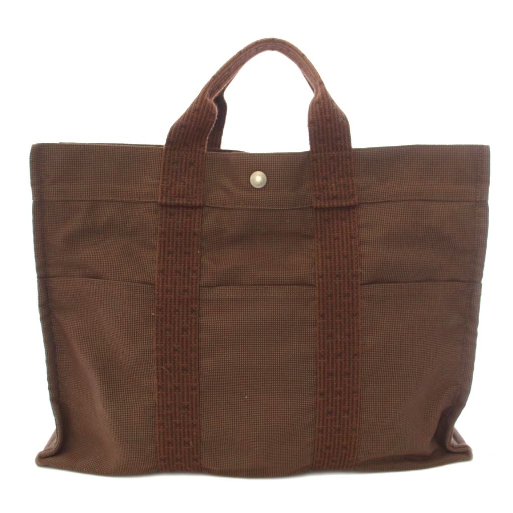 【中古】エルメス HERMES エールライン トートMM トートバッグ キャンバス A4 茶 ブラウン /TK ■OH レディース 【ベクトル 古着】 260814ブランドエルメス HERMES実寸サイズ持ち手の長さ：22cm　ヨコ：42cm　タテ：30cm　マチ：11cm　ショルダーの長さ：-cm　　素材キャンバス色茶 ブラウン状態南京錠、鍵が欠品、型崩れ、毛羽立ちや毛玉、角擦れ、持ち手に色褪せ、内側に白い汚れがあります。 ※全体的に中古品としての使用感と上記のようなダメージがあります。掲載写真や記載内容をご確認いただき、ご理解の上ご購入ください。付属品付属品なし商品のお問い合わせの回答を休止しております。＊各商品ページの商品詳細等をご確認の上ご購入ください。【中古】エルメス HERMES エールライン トートMM トートバッグ キャンバス A4 茶 ブラウン /TK ■OH レディース 【ベクトル 古着】 260814状態ランク　”B”詳細については、下記および「状態ランクについて」ページをご覧ください。未使用・新品の商品ほぼ新品同様の商品使用感が少なく、かなり状態の良い商品使用感はあるが、傷や汚れの少ない商品使用感の他、傷や汚れが見られる商品かなり大きな傷みがある難あり商品※S〜CランクはUSED品となりますので、使用感をご理解の上でご入札下さい。状態ランクについてinformationブランドエルメス HERMES実寸サイズ持ち手の長さ：22cm　ヨコ：42cm　タテ：30cm　マチ：11cm　ショルダーの長さ：-cm　　素材キャンバス色茶 ブラウン状態南京錠、鍵が欠品、型崩れ、毛羽立ちや毛玉、角擦れ、持ち手に色褪せ、内側に白い汚れがあります。 ※全体的に中古品としての使用感と上記のようなダメージがあります。掲載写真や記載内容をご確認いただき、ご理解の上ご購入ください。付属品付属品なし商品のお問い合わせの回答を休止しております。＊各商品ページの商品詳細等をご確認の上ご購入ください。本商品は一点物です他サイトや店舗にて販売している商品です。多少のお時間差にて欠品になることもございます。予めご了承頂ますようお願い致します。ベクトル・サイズガイドはこちらこの商品と同じブランドの商品を見る