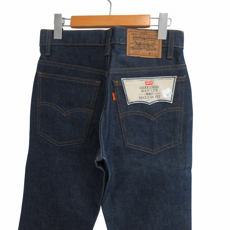 【中古】未使用品 リーバイス Levi's フラッシャー付 80's 20517-0217 デッドストック デニム オレンジタブ リジッド ジーンズ サドルマン ブーツカット フレア 紙タグ 刻印585 濃紺 W28 L34 メンズ 【ベクトル 古着】 250707
