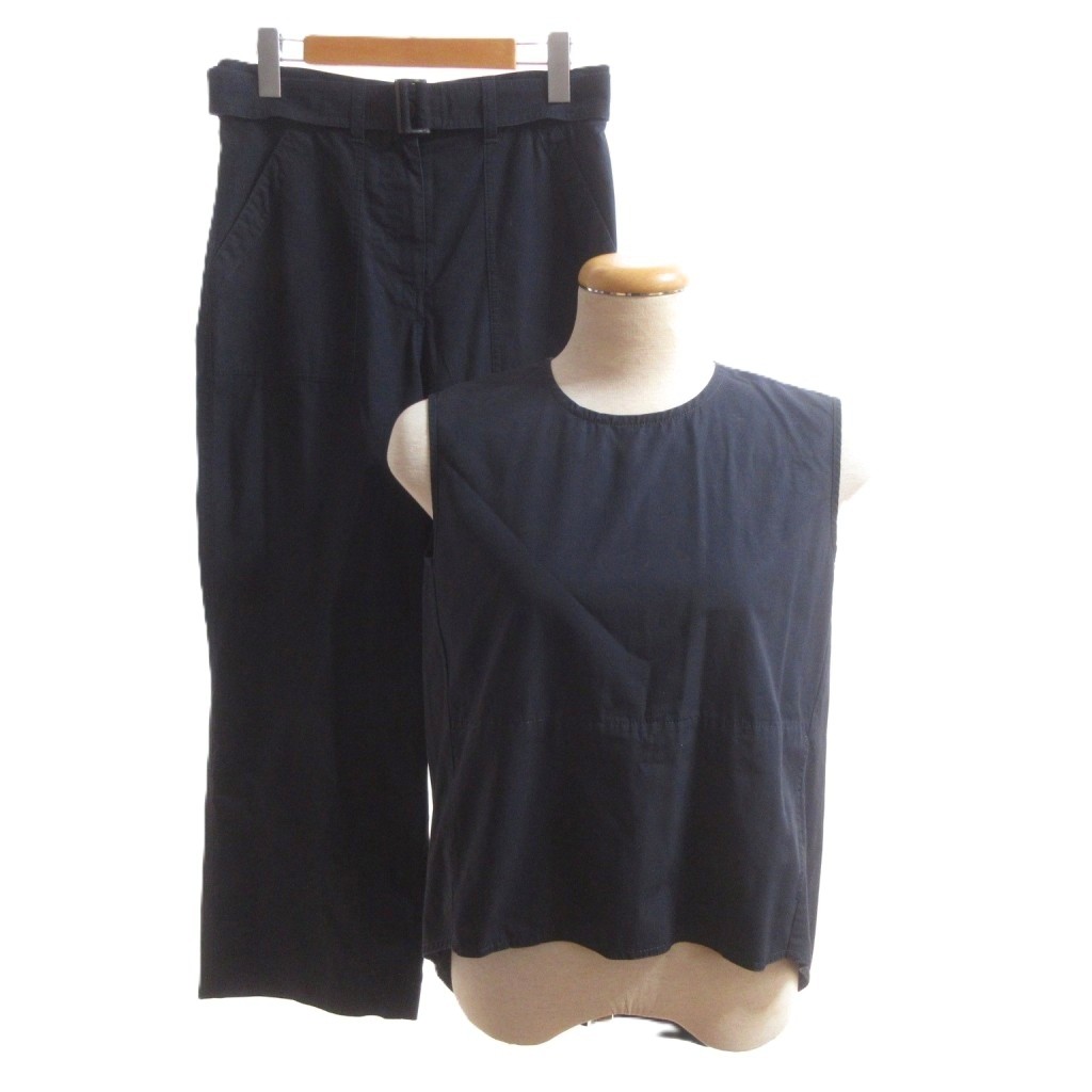 【中古】プレインピープル PLAIN PEOPLE 美品 セットアップ タンクトップ パンツ ベント イージー ウエストベルト 3 紺 ネイビー /SJ レディース 【ベクトル 古着】 260417ブランドプレインピープル PLAIN PEOPLE表記サイズ3実寸サイズジャケット 肩幅：ーcm　ジャケット 身幅：48cm　ジャケット 袖丈：ーcm　ジャケット 着丈：70cm　パンツ ウエスト：74cm　パンツ もも幅：62cm　パンツ 裾幅：24cm　パンツ 股上：32cm　パンツ 股下：65cm　　素材本体 コットン色紺 ネイビー状態使用感が少なく、かなり状態の良い商品です。 ※あくまでも中古品ですので掲載写真や記載内容をご確認いただき、ご理解の上ご購入ください。付属品ベルト備考品番：H1551FB263-1 株式会社ワン・ビー・ワン こちらのお品物は店舗で保管しておらず、店頭販売出来かねます。（※お取り寄せも出来かねます）商品のお問い合わせの回答を休止しております。＊各商品ページの商品詳細等をご確認の上ご購入ください。【中古】プレインピープル PLAIN PEOPLE 美品 セットアップ タンクトップ パンツ ベント イージー ウエストベルト 3 紺 ネイビー /SJ レディース 【ベクトル 古着】 260417状態ランク　”A”詳細については、下記および「状態ランクについて」ページをご覧ください。未使用・新品の商品ほぼ新品同様の商品使用感が少なく、かなり状態の良い商品使用感はあるが、傷や汚れの少ない商品使用感の他、傷や汚れが見られる商品かなり大きな傷みがある難あり商品※S〜CランクはUSED品となりますので、使用感をご理解の上でご入札下さい。状態ランクについてinformationブランドプレインピープル PLAIN PEOPLE表記サイズ3実寸サイズジャケット 肩幅：ーcm　ジャケット 身幅：48cm　ジャケット 袖丈：ーcm　ジャケット 着丈：70cm　パンツ ウエスト：74cm　パンツ もも幅：62cm　パンツ 裾幅：24cm　パンツ 股上：32cm　パンツ 股下：65cm　　素材本体 コットン色紺 ネイビー状態使用感が少なく、かなり状態の良い商品です。 ※あくまでも中古品ですので掲載写真や記載内容をご確認いただき、ご理解の上ご購入ください。付属品ベルト備考品番：H1551FB263-1 株式会社ワン・ビー・ワン こちらのお品物は店舗で保管しておらず、店頭販売出来かねます。（※お取り寄せも出来かねます）商品のお問い合わせの回答を休止しております。＊各商品ページの商品詳細等をご確認の上ご購入ください。本商品は一点物です他サイトや店舗にて販売している商品です。多少のお時間差にて欠品になることもございます。予めご了承頂ますようお願い致します。ベクトル・サイズガイドはこちらこの商品と同じブランドの商品を見る