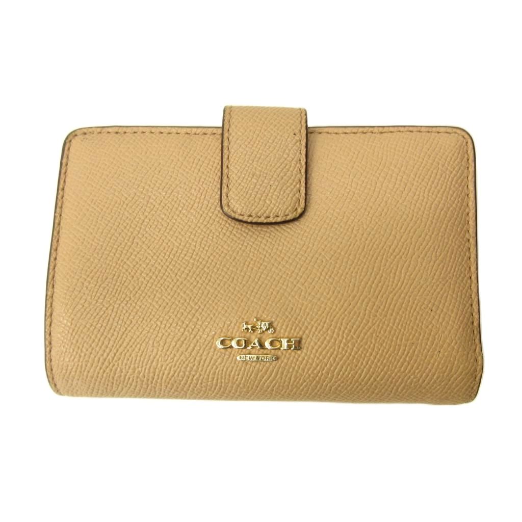 【中古】コーチ COACH 二つ折り財布 ウォレット レザー ピンク 0914 ■GY99 レディース 【ベクトル 古着】 260914ブランドコーチ COACH表記サイズ--実寸サイズヨコ：約13.5cm　タテ：約9cm　マチ：約3cm　　素材レザー色ピンク仕様お札入れ×1 小銭入れ×2 カードポケット×7 フリーポケット×3状態・底面の縁に薄汚れ ・折り目の内側に細かなひび割れ その他に目立ったダメージはなく、問題なくご使用いただける商品です。 ※あくまでも中古品ですので掲載写真や記載内容をご確認いただき、ご理解の上ご購入ください。付属品--備考品番なし こちらのお品物は店舗で保管しておらず、店頭販売出来かねます。（※お取り寄せも出来かねます）商品のお問い合わせの回答を休止しております。＊各商品ページの商品詳細等をご確認の上ご購入ください。【中古】コーチ COACH 二つ折り財布 ウォレット レザー ピンク 0914 ■GY99 レディース 【ベクトル 古着】 260914状態ランク　”AB”詳細については、下記および「状態ランクについて」ページをご覧ください。未使用・新品の商品ほぼ新品同様の商品使用感が少なく、かなり状態の良い商品使用感はあるが、傷や汚れの少ない商品使用感の他、傷や汚れが見られる商品かなり大きな傷みがある難あり商品※S〜CランクはUSED品となりますので、使用感をご理解の上でご入札下さい。状態ランクについてinformationブランドコーチ COACH表記サイズ--実寸サイズヨコ：約13.5cm　タテ：約9cm　マチ：約3cm　　素材レザー色ピンク仕様お札入れ×1 小銭入れ×2 カードポケット×7 フリーポケット×3状態・底面の縁に薄汚れ ・折り目の内側に細かなひび割れ その他に目立ったダメージはなく、問題なくご使用いただける商品です。 ※あくまでも中古品ですので掲載写真や記載内容をご確認いただき、ご理解の上ご購入ください。付属品--備考品番なし こちらのお品物は店舗で保管しておらず、店頭販売出来かねます。（※お取り寄せも出来かねます）商品のお問い合わせの回答を休止しております。＊各商品ページの商品詳細等をご確認の上ご購入ください。本商品は一点物です他サイトや店舗にて販売している商品です。多少のお時間差にて欠品になることもございます。予めご了承頂ますようお願い致します。ベクトル・サイズガイドはこちらこの商品と同じブランドの商品を見る