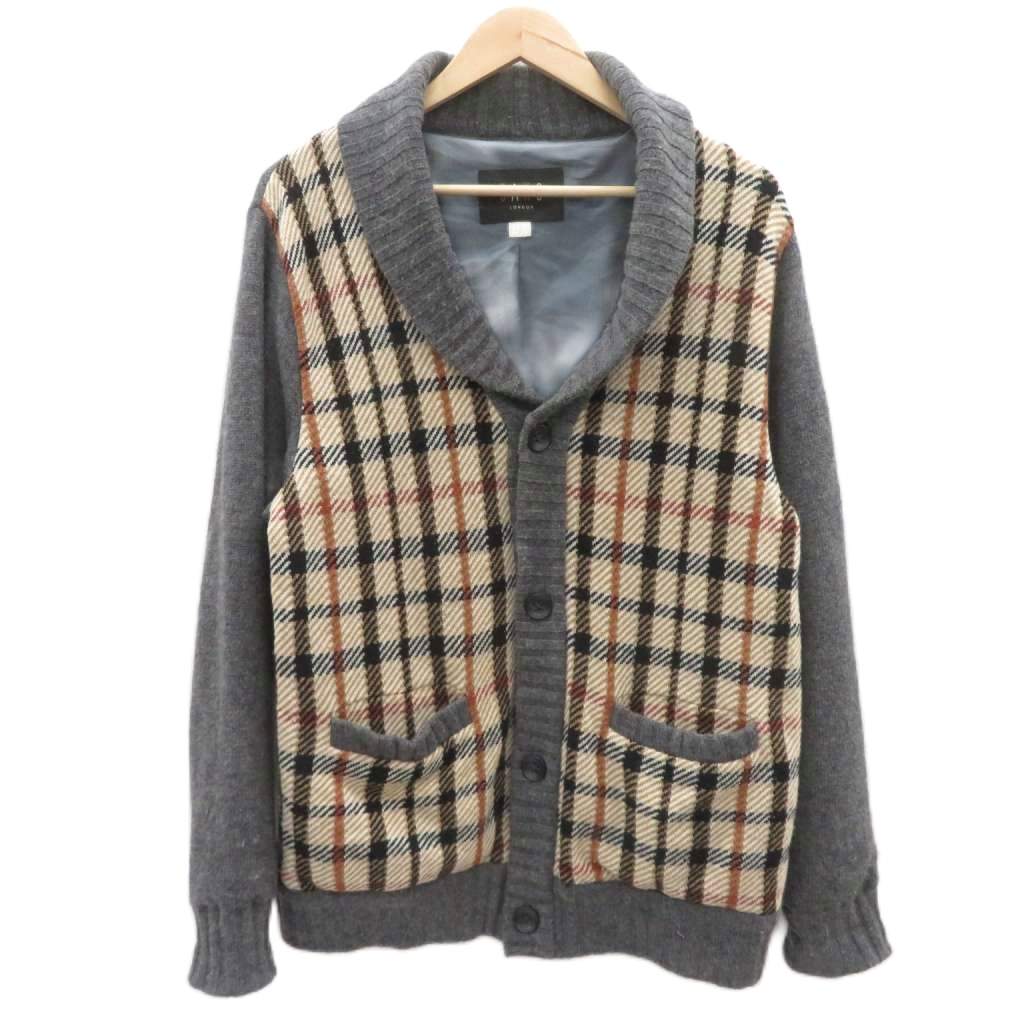 【中古】ダックス DAKS ニットカーディガン ショールカラー M マルチカラー チャコールグレー チェック柄 /HO41 ■GY44 メンズ 【ベクトル 古着】 260521ブランドダックス DAKS表記サイズM実寸サイズ肩幅：47cm　身幅：56cm　着丈：73cm　袖丈：61.5cm　　素材表地 毛 裏地 ポリエステル色チャコールグレー ベージュ 赤仕様フロントボタン 伸縮性なし 透け感なし 裏地あり状態この商品には下記のようなダメージがあります。 ・全体的に毛玉と毛羽立ち ・前身頃ボタン付近にシミ ※全体的に中古品としての使用感とダメージがありますが、通常使用には支障のない商品です。 掲載写真や記載内容をご確認いただき、ご理解の上ご購入ください。付属品替えボタン×1備考品番なし 日登美株式会社商品のお問い合わせの回答を休止しております。＊各商品ページの商品詳細等をご確認の上ご購入ください。【中古】ダックス DAKS ニットカーディガン ショールカラー M マルチカラー チャコールグレー チェック柄 /HO41 ■GY44 メンズ 【ベクトル 古着】 260521状態ランク　”B”詳細については、下記および「状態ランクについて」ページをご覧ください。未使用・新品の商品ほぼ新品同様の商品使用感が少なく、かなり状態の良い商品使用感はあるが、傷や汚れの少ない商品使用感の他、傷や汚れが見られる商品かなり大きな傷みがある難あり商品※S〜CランクはUSED品となりますので、使用感をご理解の上でご入札下さい。状態ランクについてinformationブランドダックス DAKS表記サイズM実寸サイズ肩幅：47cm　身幅：56cm　着丈：73cm　袖丈：61.5cm　　素材表地 毛 裏地 ポリエステル色チャコールグレー ベージュ 赤仕様フロントボタン 伸縮性なし 透け感なし 裏地あり状態この商品には下記のようなダメージがあります。 ・全体的に毛玉と毛羽立ち ・前身頃ボタン付近にシミ ※全体的に中古品としての使用感とダメージがありますが、通常使用には支障のない商品です。 掲載写真や記載内容をご確認いただき、ご理解の上ご購入ください。付属品替えボタン×1備考品番なし 日登美株式会社商品のお問い合わせの回答を休止しております。＊各商品ページの商品詳細等をご確認の上ご購入ください。本商品は一点物です他サイトや店舗にて販売している商品です。多少のお時間差にて欠品になることもございます。予めご了承頂ますようお願い致します。ベクトル・サイズガイドはこちらこの商品と同じブランドの商品を見る