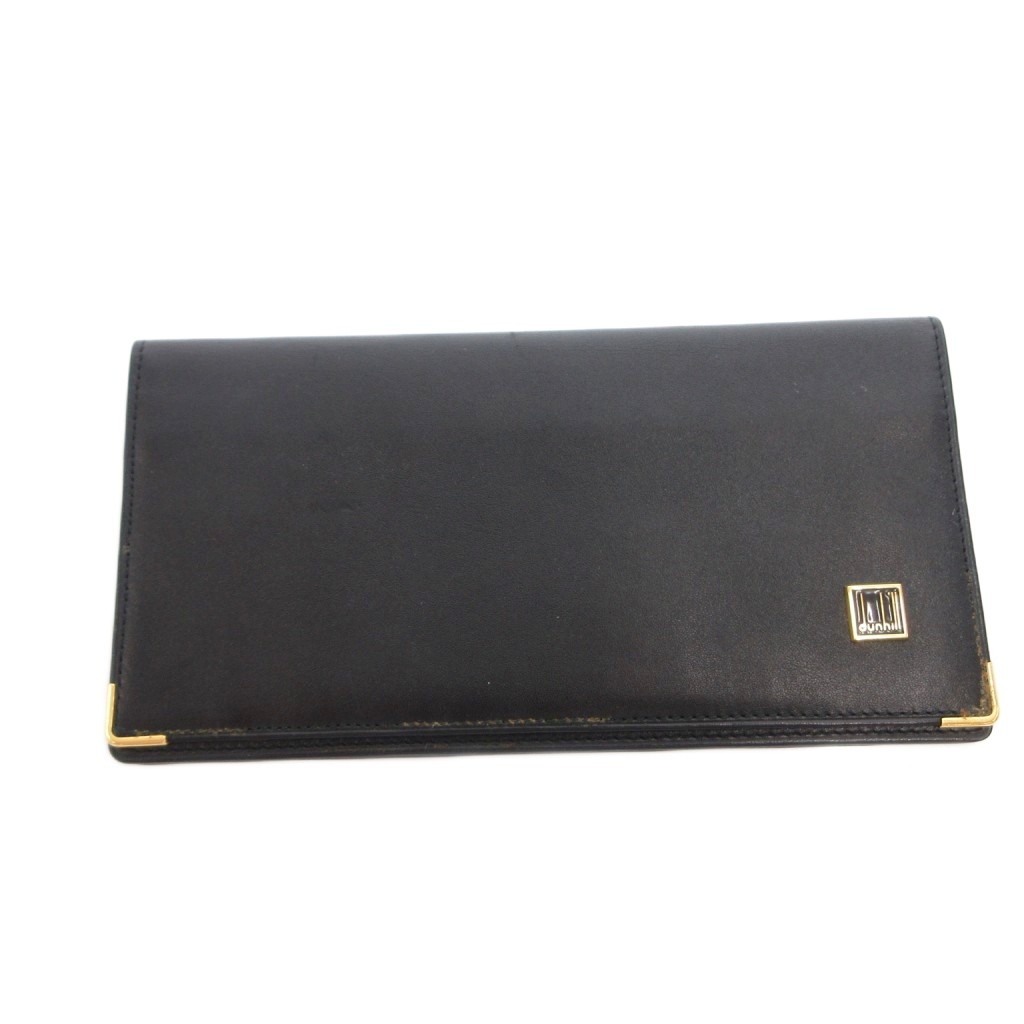 【中古】ダンヒル dunhill 長財布 ウォレット 小銭入れなし レザー ロゴ 黒 ブラック /FF ■GY11 メンズ 【ベクトル 古着】 260629ブランドダンヒル dunhill実寸サイズヨコ：18cm　タテ：9cm　マチ：1cm　　素材レザー色黒 ブラック 状態・角、表面内側擦れ ・金具傷 ※全体的に中古品としての使用感とダメージがありますが、通常使用には支障のない商品です。 掲載写真や記載内容をご確認いただき、ご理解の上ご購入ください。備考こちらのお品物は店舗で保管しておらず、店頭販売出来かねます。（※お取り寄せも出来かねます）商品のお問い合わせの回答を休止しております。＊各商品ページの商品詳細等をご確認の上ご購入ください。【中古】ダンヒル dunhill 長財布 ウォレット 小銭入れなし レザー ロゴ 黒 ブラック /FF ■GY11 メンズ 【ベクトル 古着】 260629状態ランク　”B”詳細については、下記および「状態ランクについて」ページをご覧ください。未使用・新品の商品ほぼ新品同様の商品使用感が少なく、かなり状態の良い商品使用感はあるが、傷や汚れの少ない商品使用感の他、傷や汚れが見られる商品かなり大きな傷みがある難あり商品※S〜CランクはUSED品となりますので、使用感をご理解の上でご入札下さい。状態ランクについてinformationブランドダンヒル dunhill実寸サイズヨコ：18cm　タテ：9cm　マチ：1cm　　素材レザー色黒 ブラック 状態・角、表面内側擦れ ・金具傷 ※全体的に中古品としての使用感とダメージがありますが、通常使用には支障のない商品です。 掲載写真や記載内容をご確認いただき、ご理解の上ご購入ください。備考こちらのお品物は店舗で保管しておらず、店頭販売出来かねます。（※お取り寄せも出来かねます）商品のお問い合わせの回答を休止しております。＊各商品ページの商品詳細等をご確認の上ご購入ください。本商品は一点物です他サイトや店舗にて販売している商品です。多少のお時間差にて欠品になることもございます。予めご了承頂ますようお願い致します。ベクトル・サイズガイドはこちらこの商品と同じブランドの商品を見る