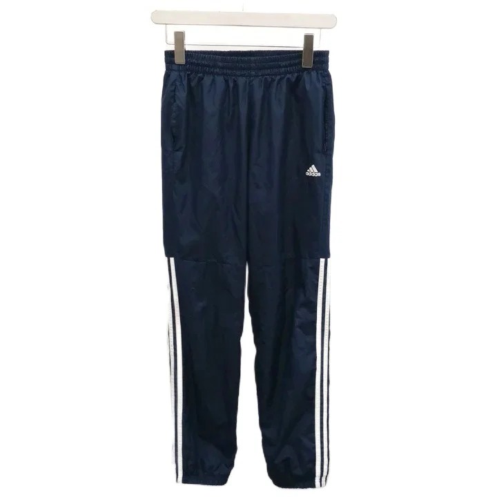 【中古】アディダス adidas ウインドブレーカーパンツ スポーツ ロゴ刺繍 160 紺 ネイビー /RY ■GY06 キッズ 【ベクトル 古着】 260824ブランドアディダス adidas表記サイズ160実寸サイズウエスト：60cm　もも幅：26cm　裾幅：13cm　股上：24cm　股下：72cm　　素材表地：ポリエステル 裏地：ポリエステル色紺 ネイビー状態使用感が少なく、かなり状態の良い商品です。 ※あくまでも中古品ですので掲載写真や記載内容をご確認いただき、ご理解の上ご購入ください。備考アディダスジャパン株式会社商品のお問い合わせの回答を休止しております。＊各商品ページの商品詳細等をご確認の上ご購入ください。【中古】アディダス adidas ウインドブレーカーパンツ スポーツ ロゴ刺繍 160 紺 ネイビー /RY ■GY06 キッズ 【ベクトル 古着】 260824状態ランク　”A”詳細については、下記および「状態ランクについて」ページをご覧ください。未使用・新品の商品ほぼ新品同様の商品使用感が少なく、かなり状態の良い商品使用感はあるが、傷や汚れの少ない商品使用感の他、傷や汚れが見られる商品かなり大きな傷みがある難あり商品※S〜CランクはUSED品となりますので、使用感をご理解の上でご入札下さい。状態ランクについてinformationブランドアディダス adidas表記サイズ160実寸サイズウエスト：60cm　もも幅：26cm　裾幅：13cm　股上：24cm　股下：72cm　　素材表地：ポリエステル 裏地：ポリエステル色紺 ネイビー状態使用感が少なく、かなり状態の良い商品です。 ※あくまでも中古品ですので掲載写真や記載内容をご確認いただき、ご理解の上ご購入ください。備考アディダスジャパン株式会社商品のお問い合わせの回答を休止しております。＊各商品ページの商品詳細等をご確認の上ご購入ください。本商品は一点物です他サイトや店舗にて販売している商品です。多少のお時間差にて欠品になることもございます。予めご了承頂ますようお願い致します。ベクトル・サイズガイドはこちらこの商品と同じブランドの商品を見る