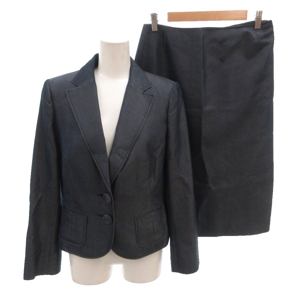 【中古】ニナリッチ NINA RICCI セットアップ スーツ テーラードジャケット 背抜き 2b スカート ひざ丈 シルク 絹 42 紺 ネイビー /FF レディース 【ベクトル 古着】 260518ブランドニナリッチ NINA RICCI表記サイズ42実寸サイズジャケット 肩幅：37cm　ジャケット 身幅：45cm　ジャケット 袖丈：57cm　ジャケット 着丈：52cm　スカート ウエスト：68cm　スカート ヒップ：90cm　スカート丈：68cm　　素材シルク54％ コットン色紺 ネイビー 状態・襟に擦れ ・スカート前面シミ その他に目立ったダメージはなく、問題なくご使用いただける商品です。 ※あくまでも中古品ですので掲載写真や記載内容をご確認いただき、ご理解の上ご購入ください。備考ニナリッチプレスティージ 株 こちらのお品物は店舗で保管しておらず、店頭販売出来かねます。（※お取り寄せも出来かねます）商品のお問い合わせの回答を休止しております。＊各商品ページの商品詳細等をご確認の上ご購入ください。【中古】ニナリッチ NINA RICCI セットアップ スーツ テーラードジャケット 背抜き 2b スカート ひざ丈 シルク 絹 42 紺 ネイビー /FF レディース 【ベクトル 古着】 260518状態ランク　”AB”詳細については、下記および「状態ランクについて」ページをご覧ください。未使用・新品の商品ほぼ新品同様の商品使用感が少なく、かなり状態の良い商品使用感はあるが、傷や汚れの少ない商品使用感の他、傷や汚れが見られる商品かなり大きな傷みがある難あり商品※S〜CランクはUSED品となりますので、使用感をご理解の上でご入札下さい。状態ランクについてinformationブランドニナリッチ NINA RICCI表記サイズ42実寸サイズジャケット 肩幅：37cm　ジャケット 身幅：45cm　ジャケット 袖丈：57cm　ジャケット 着丈：52cm　スカート ウエスト：68cm　スカート ヒップ：90cm　スカート丈：68cm　　素材シルク54％ コットン色紺 ネイビー 状態・襟に擦れ ・スカート前面シミ その他に目立ったダメージはなく、問題なくご使用いただける商品です。 ※あくまでも中古品ですので掲載写真や記載内容をご確認いただき、ご理解の上ご購入ください。備考ニナリッチプレスティージ 株 こちらのお品物は店舗で保管しておらず、店頭販売出来かねます。（※お取り寄せも出来かねます）商品のお問い合わせの回答を休止しております。＊各商品ページの商品詳細等をご確認の上ご購入ください。本商品は一点物です他サイトや店舗にて販売している商品です。多少のお時間差にて欠品になることもございます。予めご了承頂ますようお願い致します。ベクトル・サイズガイドはこちらこの商品と同じブランドの商品を見る