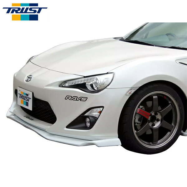 車メーカーTOYOTA車種86 ハチロク型式ZN6年式12.04〜16.06備考車両全長が55mmロング、ノーマルバンパーより約15mmダウン、本体サイズ　幅1775mm後期装着不可品番17010211商品名ワイドバージョンフロントアンダースポイラー（FRP）注意事項※ お客様の見落としや確認ミスでのキャンセル・交換・返品は一切お受けできません。※ 商品画像は代表車種の物です。車種毎に形状は異なります。※ 適合情報は随時更新しておりますが、告知なくメーカー側にて更新される場合がございますので、必ずご注文前にメーカー適合表にて最新の適合表をご確認頂ますようお願い致します。納期についてメーカー在庫があれば2～3日営業日、欠品時は1ヶ月～お時間がかかります。お急ぎの場合はご注文前に必ず在庫確認をお願い致します。※納期が遅い等によるキャンセルは一切お受けできません。トラスト GReddy グレッディ エアロ