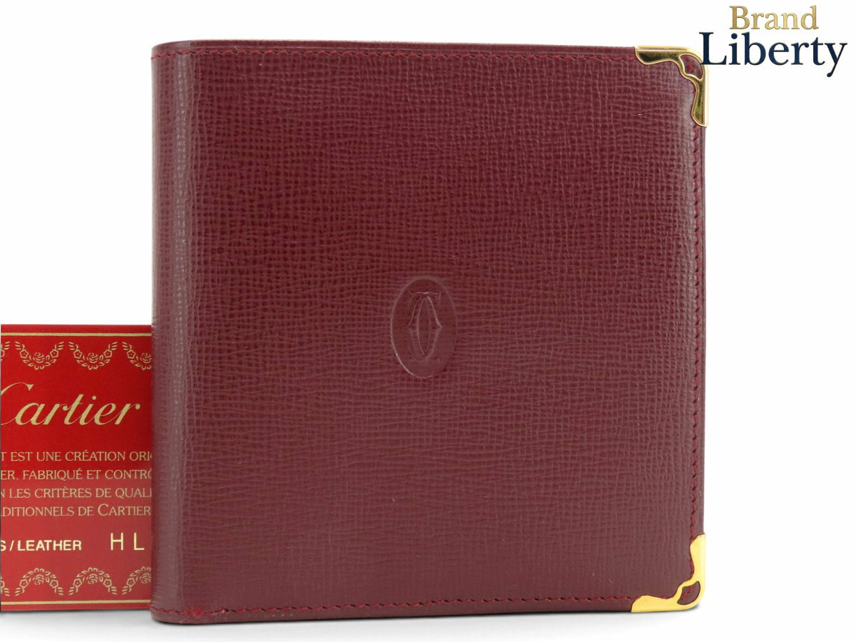 CARTIER - 【ほぼ新品】カルティエ Cartier マストドゥカルティエ 二つ折り財布 コンパクト財布 ボルドー カーフレザー L3000165　【中古】