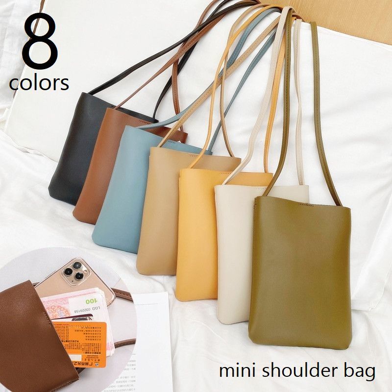 樂天商城 - ショルダーバッグ ポシェット サコッシュ レディース bag レザー調 スマホポーチ ミニショルダー マグネット開閉 縦長 無地 シンプル 肩掛け 斜め掛け 薄型 ホワイト ピンク ブラウン ブラック ブルー