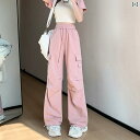 レディースワイドパンツ シンプル 大人カジュアル ピンクの 韓国 服装の ズボンの 新型の 女性は 腰を 緩めて ゆったりと していて やせている 潮流の 大きい ポケットの 百合の 運動の レジャーの ズボンを 現します。