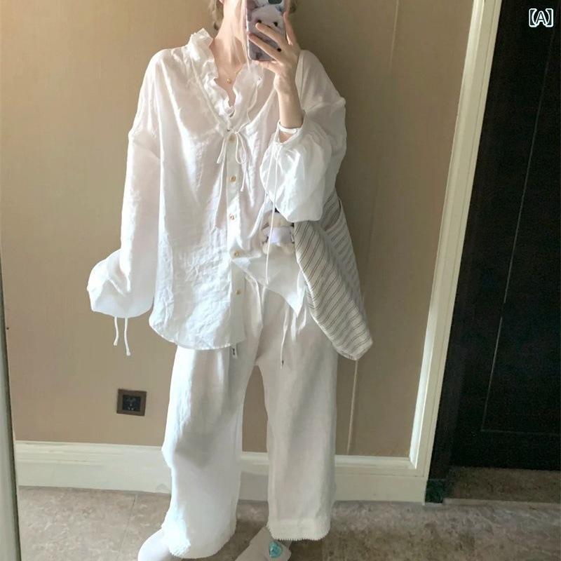 セットアップ レディース Vネック フランスの 高級 感の ある ハスの 葉の 縁の v ネックは 長袖の シャツ レディース 夏の ハイウエストの カジュアル 広い 足の ズボンの 2つの セットを 持ちます。