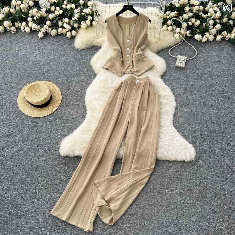 セットアップ レディース Vネック おしゃれな スーツ レディース 夏の 軽 熟 風は 腰の v ネックの 袖なしの 上着の高 腰で やせている ワイド パンツの フランスの 2つの セットを 収めます。