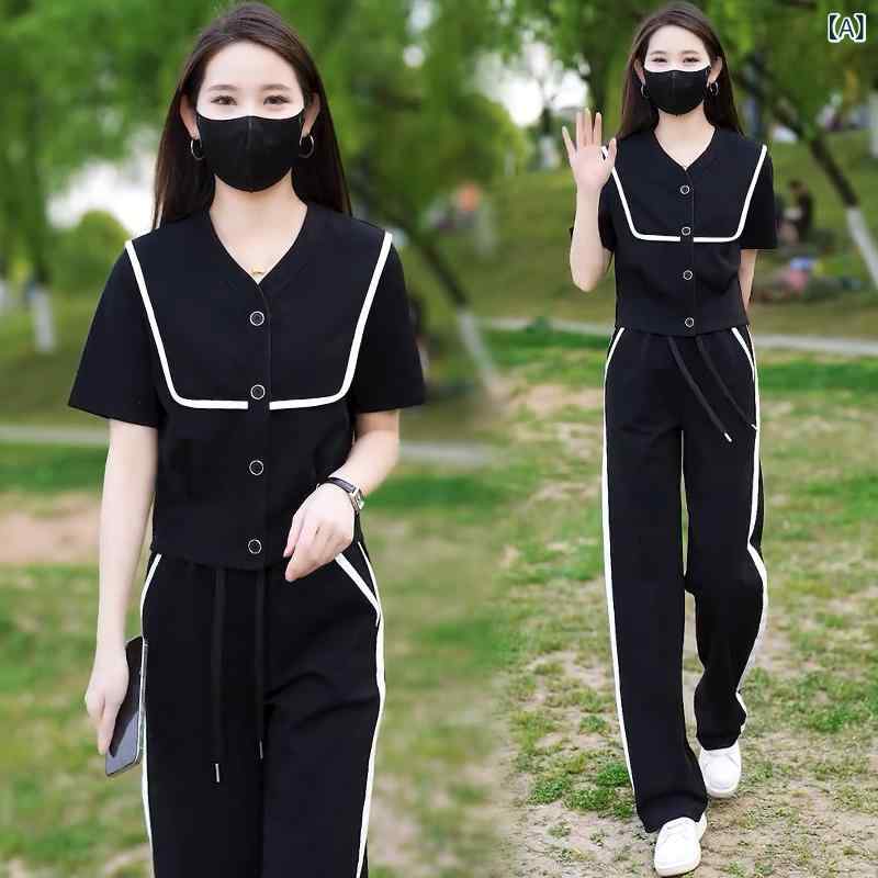 セットアップ レディース Vネック ファッション カジュアル スーツ レディース 夏の 新型の 洋風のは 腰を 収めて やせている v ネックの 半袖の 上着の 広い 足の ズボンの 2つの セットを 現します。