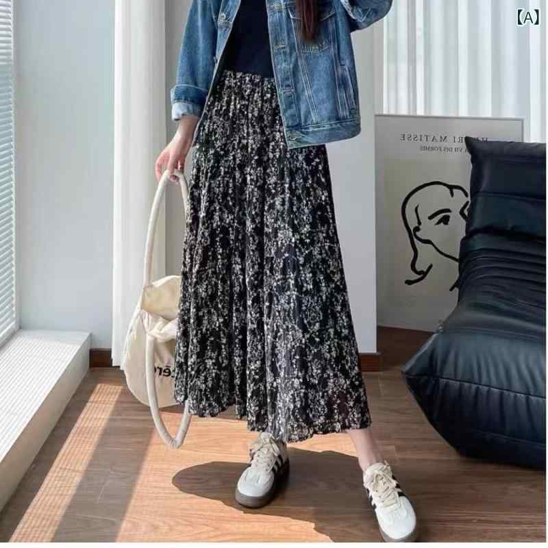 花柄ロングプリーツスカート フラワープリント 砕 花 シフォンの しわが 半身の スカートを 緩めています。 女性は 春夏 韓国で 痩せています。