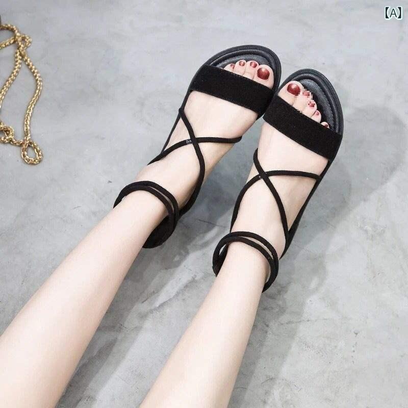 レディース ストラップサンダル 韓国 女性用 サンダル 2025 夏の新 スタイル フラット ヒール 学生 クロス ストラップ ローマン ビーチ フェアリーの 靴