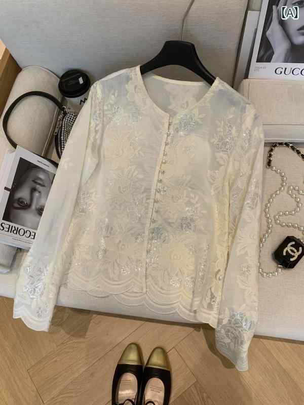 きれいめ 刺繍 大人 カジュアル フェミニン メンズ レディース 刺繍 2025春の白い重工刺繍のな女性用刺繍入りシャツ。復古的な国風でゆったりとした着心地。盤扣バックル仕様で長袖のトップスです。