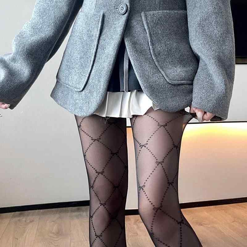 フェイクタイツ 発熱 静電気防止 ストッキング見えタイツ 菱の 形の 破 線の 蝶 結びの ジャカードは 芯の 糸を 包んで セクシーです。