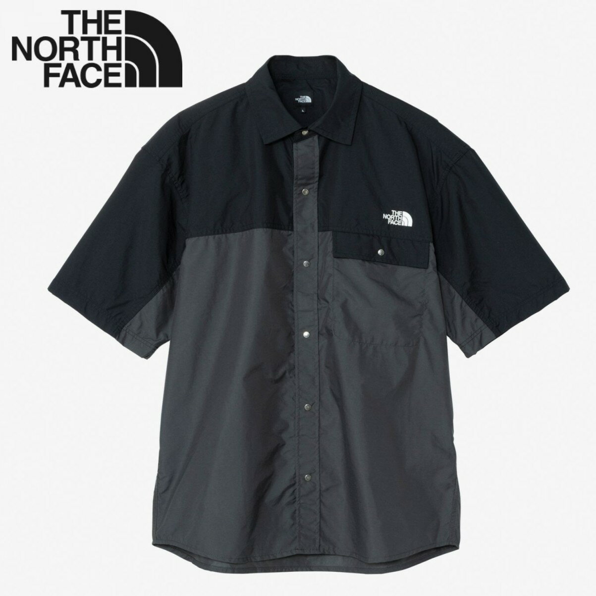 【 ザ・ノースフェイス NR22552 ショートスリーブヌプシシャツ ユニセックス ブラック×アスファルトグレー(BA) 】 はっ水性を持ち合わせたナイロン素材 フロントは着脱のしやすいドットボタン仕様 時流に合わせたバランスのよいサイズ感にアップデート