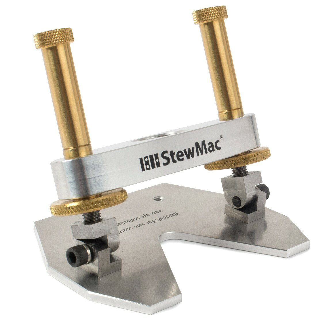 PRODUCT DETAILS StewMac チルトルーターベース サドルスロット加工 バインディング溝切り ギター ベース マンドリン リペア工具 製作工具 角度調整式 Dremel対応【商品仕様】・ ブランド：StewMac・ 品目：チルトルーターベース（角度調整式ルーターアタッチメント）・ 用途：傾斜サドルスロットの加工、ヘッドのバインディング溝切り、ルーティング作業・ 対応楽器：ギター、ベース、マンドリン、その他弦楽器・ 対応機種：3/4-12スレッドを持つ小型ルーター（Dremel 100, 4000, 400XPR, Professional, MultiPro, Black & Decker Wizard, RTX 等）・ 調整精度：つまみ1回転につき0.035インチ（約0.889mm）の深さ調整・ 材質：削り出しスチール、真鍮、アルミニウム・ 付属品：セットアップ説明書【特徴】・ ベース部分を左右に傾斜させて固定することが可能で、角度の付いたサドルスロットやヘッドのバインディング溝切り等の精密な加工に対応します。・ 調整用の大型ノブを回すことで、0.035インチ（約0.889mm）単位での正確な深さ調整が可能です。・ ツインハンドルによる安定した操作性と、作業箇所をクリアに視認できるオープンデザインを採用しています。・ 加工時に発生する粉塵を吹き飛ばすためのミニエアポンプ（別売）を接続できる専用ノズルを内蔵しています。【ご注意】・ 米国仕様の製品です。インチ規格のサイズ・番手表記の場合があります。・ 工具の使用には楽器リペアの知識が必要です。作業による楽器の損傷について当店は責任を負いかねます。 ■ 商品について 海外輸入品（説明書は英語表記の場合あり） ■ ご注意 ・掲載画像は実物に近い色味になるよう調整しておりますが、ご利用の環境により差異が生じる場合があります。・複数店舗で在庫を共有しているため、ご注文後に在庫切れとなる場合がございます。 ■ 納期について お届けの目安を必ずご確認ください。 海外正規ルート仕入れ品 海外ブランド ▼ 海外正規ブランド店 正規代理店 ▼ 当 店 ※本商品は並行輸入品です 製造元は正規品と同一のブランド・メーカーです。当店では海外正規ルートより仕入れた商品を取り扱っております。流通ルートが異なるのみで、商品自体に違いはございません。 ── 当店の商品について ── 正規品のみ取り扱い 海外正規店・正規代理店から商品を直接仕入れ、国内に輸入して販売しております。 日本未入荷・海外限定モデルも多数 日本未入荷・海外限定モデルも多数取り扱っております。サイズ・カラー違いや海外限定で販売された製品など、日本では手に入りにくいアイテムをお届けいたします。 お求めやすい価格の理由 海外市場での価格差や流通ルートの違いにより、国内販売価格よりお求めやすくなっております。品質はそのままに、よりお手頃な価格でお届けいたします。 安心保証 ご使用前に万が一、製品に不具合がございました場合は、交換または商品代金のご返金にて対応させていただきます。商品到着後5日以内にご連絡ください。 ご注意 海外からの輸入品となります。海外輸送のため、外箱に軽微なスレ等がある場合がございますが、商品本体には影響ございません。 ※在庫状況は仕入先の在庫情報をもとに出来る限り正確に表示しておりますが、取寄せ商品のため、タイミングによりご注文後に欠品・キャンセルとなる場合がございます。 お探しの商品がございましたら、お気軽にご相談ください。