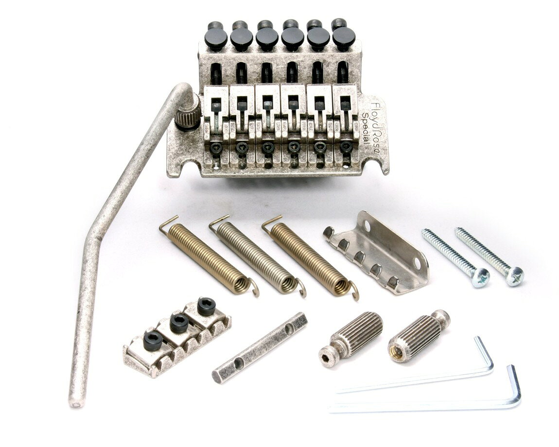 PRODUCT DETAILS Floyd Rose FW-3PK-ORG-SM Special Series ギター用 トレモロブリッジ R3ASナット付属 アンティークシルバー【商品仕様】・ ブランド：Floyd Rose・ 型番：FW-3PK-ORG-SM (Special Series)・ 品目：ギター用トレモロブリッジ・ 形状：ダブルロッキング・トレモロ・ ナットサイズ：R3・ サドル材質：亜鉛合金（ジンク）・ サスティーンブロック材質：亜鉛合金（ジンク）・ ベースプレート材質：スチール・ カラー：アンティークシルバー・ 製造国：韓国・ 付属品：ブリッジ本体、ロッキングナット、スプリング、スプリングハンガー、マウントスタッド、取付用ハードウェア一式【特徴】・ Original Floyd Roseのデザインと仕様を継承しつつ、コストパフォーマンスを追求したSpecialシリーズのトレモロユニットです。・ サドルとサスティーンブロックに亜鉛合金を採用し、ベースプレートやスクリュー類には耐久性の高いスチールを使用しています。・ 摩擦を最小限に抑えるナイフエッジデザインにより、スムーズなアクションと安定したチューニングを両立しています。・ R3サイズのロッキングナットを含む、取り付けに必要なすべてのハードウェアが付属するコンプリートキットです。【ご注意】・ 取り付けには加工・配線作業が必要な場合があります。お手持ちの楽器との適合（弦数・サイズ・取付穴位置）をご確認のうえご注文ください。・ アクティブタイプのピックアップは9V電池が必要です（電池は付属しない場合があります）。 ■ 商品について 海外輸入品（説明書は英語表記の場合あり） ■ ご注意 ・掲載画像は実物に近い色味になるよう調整しておりますが、ご利用の環境により差異が生じる場合があります。・複数店舗で在庫を共有しているため、ご注文後に在庫切れとなる場合がございます。 ■ 納期について お届けの目安を必ずご確認ください。 海外正規ルート仕入れ品 海外ブランド ▼ 海外正規ブランド店 正規代理店 ▼ 当 店 ※本商品は並行輸入品です 製造元は正規品と同一のブランド・メーカーです。当店では海外正規ルートより仕入れた商品を取り扱っております。流通ルートが異なるのみで、商品自体に違いはございません。 ── 当店の商品について ── 正規品のみ取り扱い 海外正規店・正規代理店から商品を直接仕入れ、国内に輸入して販売しております。 日本未入荷・海外限定モデルも多数 日本未入荷・海外限定モデルも多数取り扱っております。サイズ・カラー違いや海外限定で販売された製品など、日本では手に入りにくいアイテムをお届けいたします。 お求めやすい価格の理由 海外市場での価格差や流通ルートの違いにより、国内販売価格よりお求めやすくなっております。品質はそのままに、よりお手頃な価格でお届けいたします。 安心保証 ご使用前に万が一、製品に不具合がございました場合は、交換または商品代金のご返金にて対応させていただきます。商品到着後5日以内にご連絡ください。 ご注意 海外からの輸入品となります。海外輸送のため、外箱に軽微なスレ等がある場合がございますが、商品本体には影響ございません。 ※在庫状況は仕入先の在庫情報をもとに出来る限り正確に表示しておりますが、取寄せ商品のため、タイミングによりご注文後に欠品・キャンセルとなる場合がございます。 お探しの商品がございましたら、お気軽にご相談ください。
