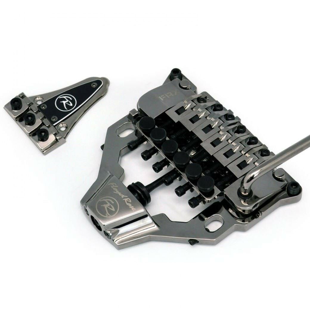 PRODUCT DETAILS Floyd Rose FRX FRTX05000 ギター用 トレモロ トップマウント ブラックニッケル【商品仕様】・ ブランド：Floyd Rose・ 型番：FRX (FRTX05000)・ 品目：トレモロ・ブリッジ・ 形状：トップマウント・ カラー：ブラックニッケル【特徴】・ ボディへの大規模なルーティング（掘り込み）加工を必要とせずに設置可能なトレモロユニットです。・ 既存のスタッドアンカー等を利用してマウントするトップマウント構造を採用しています。・ チューニングの安定性を高めるための専用ロッキングナットが付属します。【ご注意】・ 取り付けには加工・配線作業が必要な場合があります。お手持ちの楽器との適合（弦数・サイズ・取付穴位置）をご確認のうえご注文ください。・ アクティブタイプのピックアップは9V電池が必要です（電池は付属しない場合があります）。 ■ 商品について 海外輸入品（説明書は英語表記の場合あり） ■ ご注意 ・掲載画像は実物に近い色味になるよう調整しておりますが、ご利用の環境により差異が生じる場合があります。・複数店舗で在庫を共有しているため、ご注文後に在庫切れとなる場合がございます。 ■ 納期について お届けの目安を必ずご確認ください。 海外正規ルート仕入れ品 海外ブランド ▼ 海外正規ブランド店 正規代理店 ▼ 当 店 ※本商品は並行輸入品です 製造元は正規品と同一のブランド・メーカーです。当店では海外正規ルートより仕入れた商品を取り扱っております。流通ルートが異なるのみで、商品自体に違いはございません。 ── 当店の商品について ── 正規品のみ取り扱い 海外正規店・正規代理店から商品を直接仕入れ、国内に輸入して販売しております。 日本未入荷・海外限定モデルも多数 日本未入荷・海外限定モデルも多数取り扱っております。サイズ・カラー違いや海外限定で販売された製品など、日本では手に入りにくいアイテムをお届けいたします。 お求めやすい価格の理由 海外市場での価格差や流通ルートの違いにより、国内販売価格よりお求めやすくなっております。品質はそのままに、よりお手頃な価格でお届けいたします。 安心保証 ご使用前に万が一、製品に不具合がございました場合は、交換または商品代金のご返金にて対応させていただきます。商品到着後5日以内にご連絡ください。 ご注意 海外からの輸入品となります。海外輸送のため、外箱に軽微なスレ等がある場合がございますが、商品本体には影響ございません。 ※在庫状況は仕入先の在庫情報をもとに出来る限り正確に表示しておりますが、取寄せ商品のため、タイミングによりご注文後に欠品・キャンセルとなる場合がございます。 お探しの商品がございましたら、お気軽にご相談ください。
