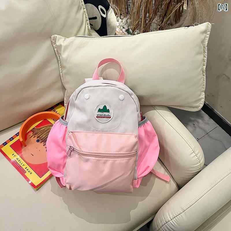 乐天商城 - 子供の 春の 遊びは リュックサックを 研究 して 色の 幼稚園の 赤ちゃんに ぶつかります。