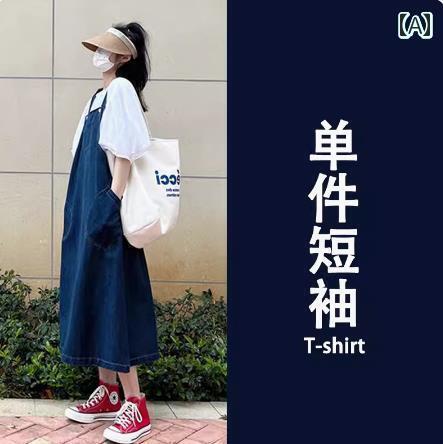 デニム　ワンピース　レディース 肉を カバー して 細く 見せる 大きめの シャツに サスペンダー 付きの デニムワンピースを 合わせれば 太った レディース フレンチファッションが 完成