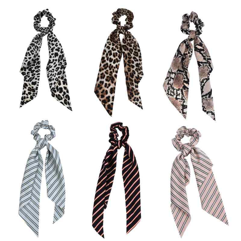 ヘアアクセサリー 女性用 ヒョウ柄 ロング フリンジ リボン ポニーテール ゴム ヘッドバンド 薄手 二合一 結び目 ディスクアップ ヘアバンド かわいい スタイリッシュ ヘアアレンジ アクセ 髪飾り 日常使い 軽量 柔らか素材 ブラウン系 パターン