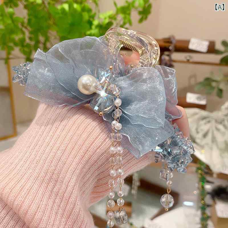 ヘアクリップ 女性用 水晶 タッセル 蝶結び リボン アップスタイル 後頭部固定 大型サメクリップ 高級感 モダンエスニック 髪飾り アクセサリー 簡単スタイリング 固定力強め 日常使い フォーマル対応