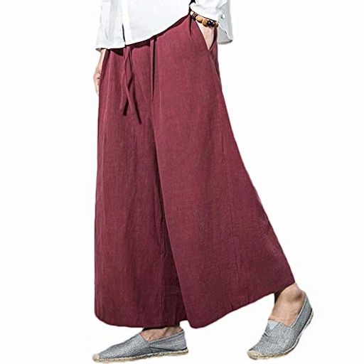 【ゆったり穿けるワイドシルエット】腰まわりから裾までゆとりを持たせた、リラックス感のあるワイドパンツ。袴のような落ち感とボリューム感があり、普段着からルームウェアまで幅広く活躍します。 【すっきり見えるストライプ柄】縦ラインを強調するストライプデザインで、シンプルなトップスと合わせるだけでも印象的なコーディネートに。カジュアル、ストリート、モード系、和風コーデにも合わせやすい一本です。 【綿麻素材でさらっとした穿き心地】綿と麻を使用したナチュラルな風合いの生地。肌にまとわりにくく、春夏の外出着や季節の変わり目のリラックスコーデにも取り入れやすい素材感です。 【ゴム紐ウエストで調節しやすい】ウエストはゴム入りで、紐によりフィット感を調整可能。締め付け感を抑えた楽な穿き心地で、部屋着、旅行、買い物、レジャー、ダンスなどにもおすすめです。 【サイズ選びについて】Mから3XLまで展開。ゆったり穿きたい方や丈感が気になる方は、普段より1サイズ上もおすすめです。ウエスト、ヒップ、総丈を基準に、商品画像のサイズ表をご確認ください。