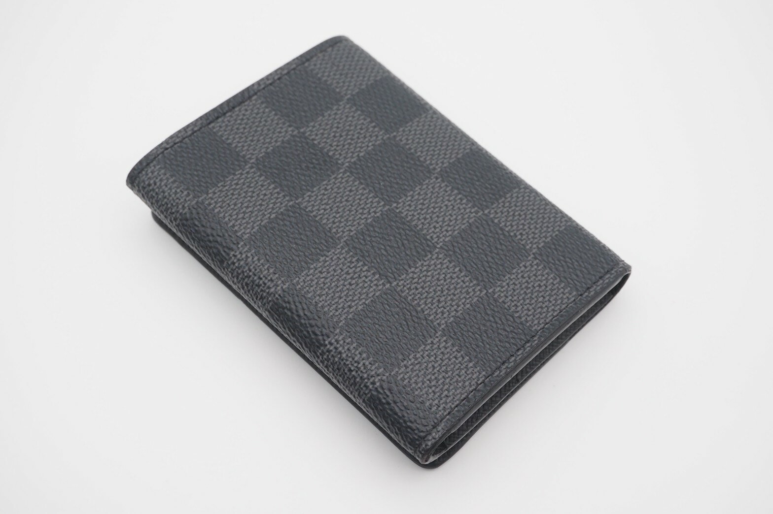 ☆安心の3大保証☆ABランク≪LOUISVUITTONルイヴィトン/二つ折りカードケース≫N63338ダミエグラフィットアンヴェロップカルトドゥヴィジットブラック美品送料無料【中古】