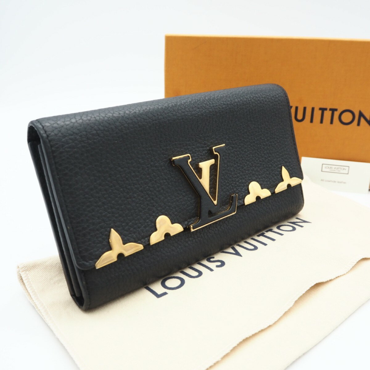 乐天商城 - ★3日以内返品可★ 美品 LOUIS VUITTON ルイ・ヴィトン トリヨン ポルトフォイユカプシーヌ M64551 長財布 ブラック ゴールド トリヨンレザー レディース【中古】