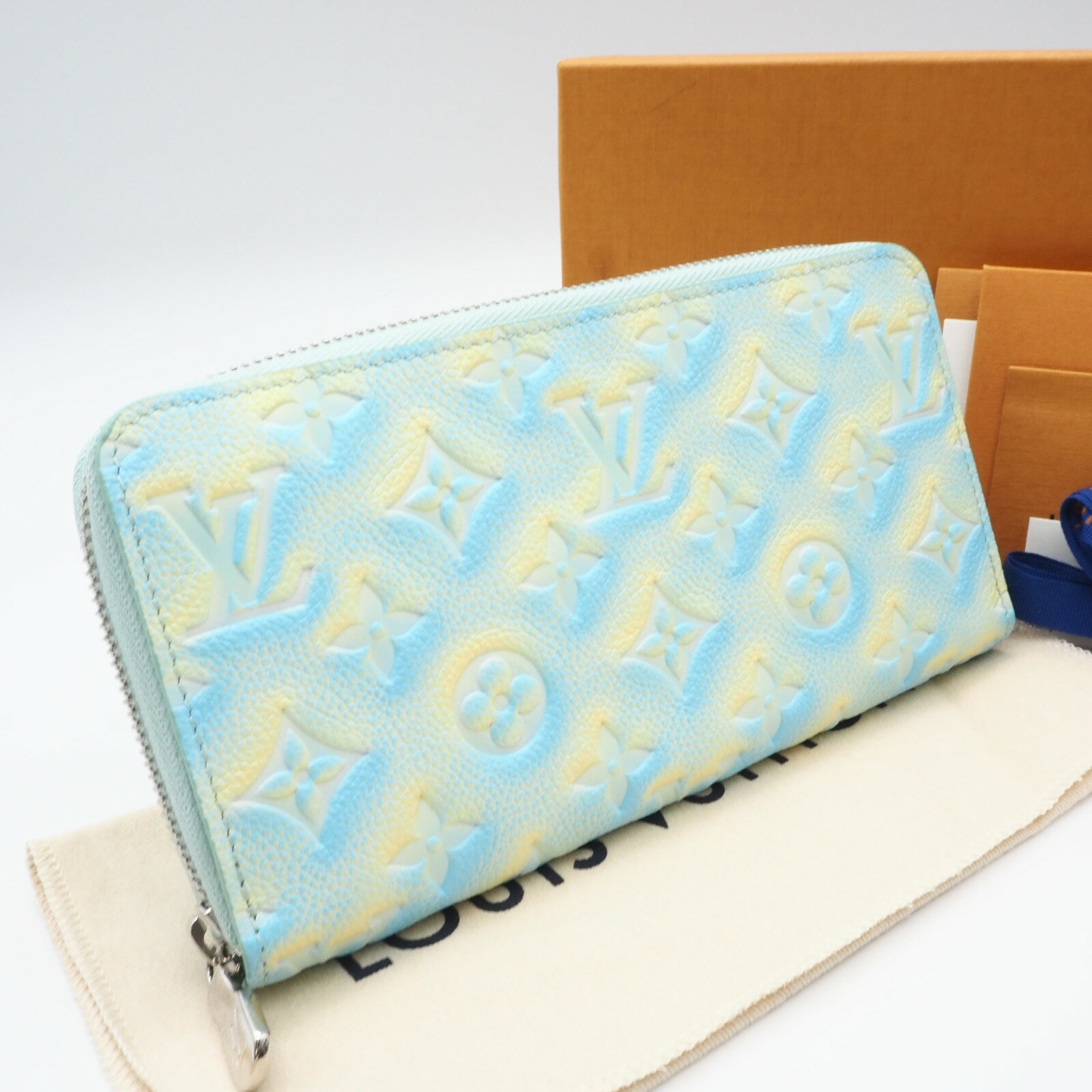 Rakuten - ★3日以内返品可★ 未使用 LOUIS VUITTON ルイ・ヴィトン モノグラム アンプラント サマー スターダスト ジッピーウォレット ヴェール ドー M81466 長財布 ブルー イエロー グレインカーフレザー レディース【中古】