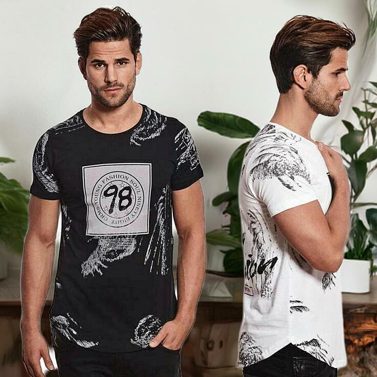 Rakuten - Tシャツ メンズ 半袖 全面ロゴ 白黒 クルーネック チュニック丈　父の日　プレゼント