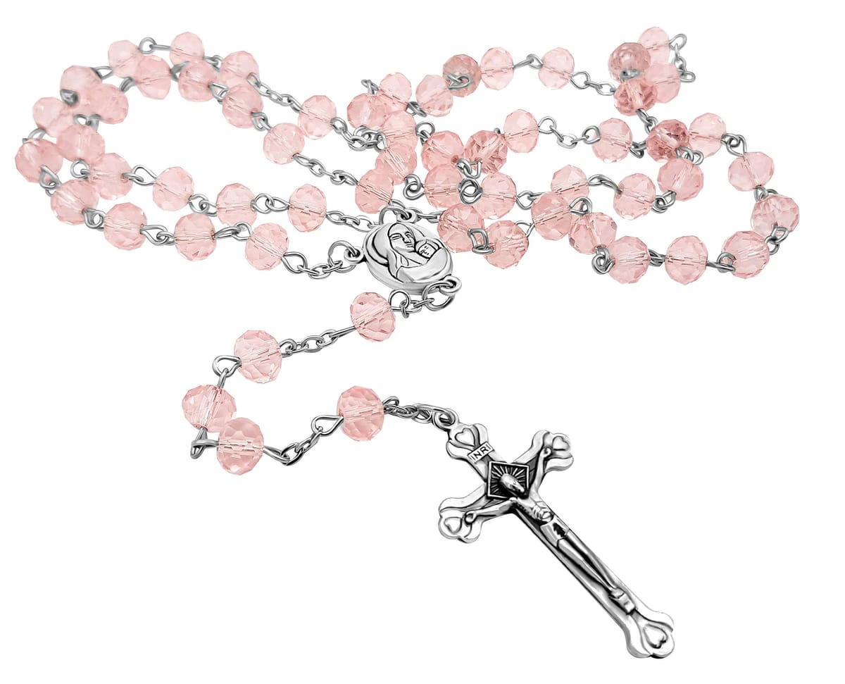 イエス・キリストのメタル製十字架像が付いたピンククリスタルビーズの素敵なカトリック教徒向けロザリオです。ビーズを散りばめた長いネックレスの中央にはエルサレムの聖地の神聖な土が入ったメダル付き。十字架のサイズ (高さ x 幅): 4 cm x 2.5 cm / 1.6インチ x 1インチ。ロザリオの長さ: 43 cm / 17インチ。お店では買えない本当に美しい＆ユニークなアイテムです。エルサレムとナザレ (聖地) で作られたほとんどのアイテムは高品質です。自宅に聖地のほんの一部を置けるチャンスをお見逃しなく。 イエス・キリストのメタル製十字架像が付いたピンククリスタルビーズの素敵なカトリック教徒向けロザリオです。ビーズを散りばめた長いネックレスの中央にはエルサレムの聖地の神聖な土が入ったメダル付き。