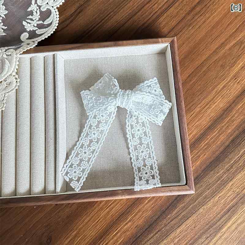 ヘアアクセサリー 白 レース チュール 刺繍 花柄 フリル 蝶結 リボン 花モチーフ ...