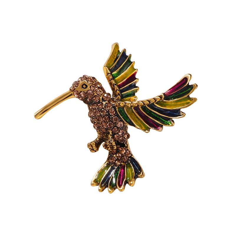 ・素材: 亜鉛合金・デザイン: 小鳥・形状: 動物・加工: 滴油・カラー展開: 金色、銀色・流行要素: 鳥・機能: 装飾、多機能、固定・スタイル: ファッションOL・スタイル分類: ファッション通勤・対象: 男女・種類: 胸針
