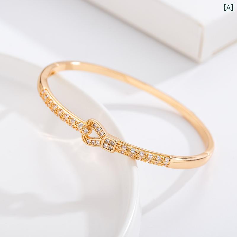 bloomelierのブレスレット レディース バングル ラインストーン キラキラ バックルモチーフ ゴールド メッキ アクセサリー 手元 華奢 細め 腕輪 普段使い パーティー 通勤用 プレゼント｜アングル2