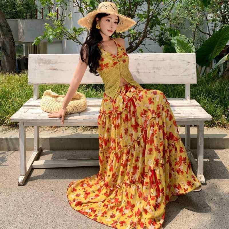 ・カテゴリ: カジュアルスーツ・スタイル: リゾート風、エレガント・柄: 花柄・スカート丈: ロング丈・デザイン特徴: バックオープン、切り替えデザイン・主な素材: ポリエステル、ポリウレタン・素材含有率: ポリエステル 50%以上70%未満、ポリウレタン 30%以下・袖丈: ノースリーブ・カラー展開: 画像通り・サイズ展開: S、M、L・性別: レディース
