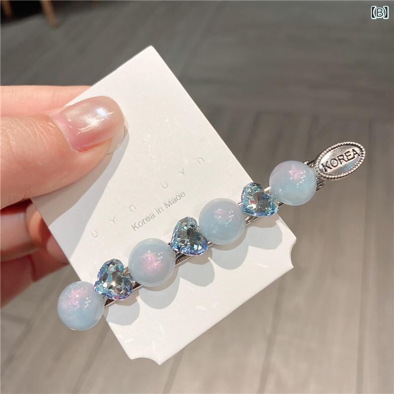 bloomelierのヘアクリップ レディース ジルコニア ハート くちばしクリップ 前髪 サイドクリップ ヘアピン 髪留め かわいい スウィート キラキラ ヘアアクセサリー 髪飾り フェミニン パステルカラー｜アングル3