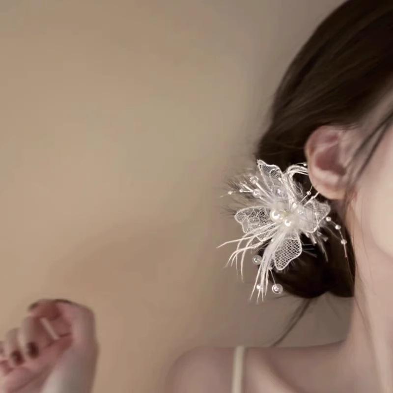 ・カテゴリ: ヘアアクセサリー・スタイル: プリンセス・スタイル分類: 清新スイート・主な素材: 人工パール・種類: ダックビルクリップ・柄: 蝶・カラー展開: 羽毛蝶エッジ、蝶エッジ・対象: レディース・加工: 手作り