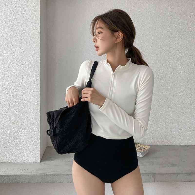 ・性別: 女性・対象年齢: 成人・デザイン: 無地、ハイウエスト、タイト、高弾性、高耐久、欧米風、コンサバティブ・スチールサポート: 胸パッドあり、スチールサポートなし・素材: ナイロン・素材含有量: 80%・重量: 約300g・裏地素材: ポリエステル・裏地含有量: 80%・適応シーン: 水泳、ウォータースポーツ・カラー展開: ホワイト、ブラック・サイズ展開: M、L、XL・袖丈: 長袖・スタイル: ビキニショーツ