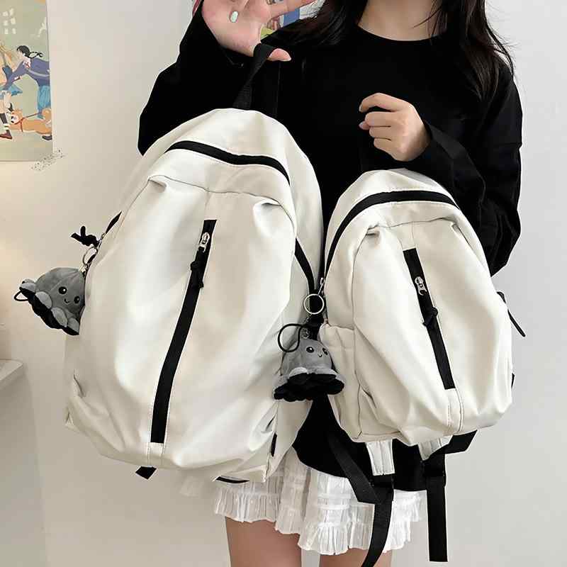 ・カテゴリ: バッグ・カラー展開: ホワイト、グリーン、レッド、ブラック・対象性別: ユニセックス・素材: ナイロン・機能: 通気性、超軽量、容量拡張・スタイル: ストリートトレンド・裏地素材: ポリエステル・柄: 無地・デザイン要素: ステッチ・サイズ展開: スモール、ラージ・推奨シーン: 通学・キャリーシステム: エアクッションストラップ