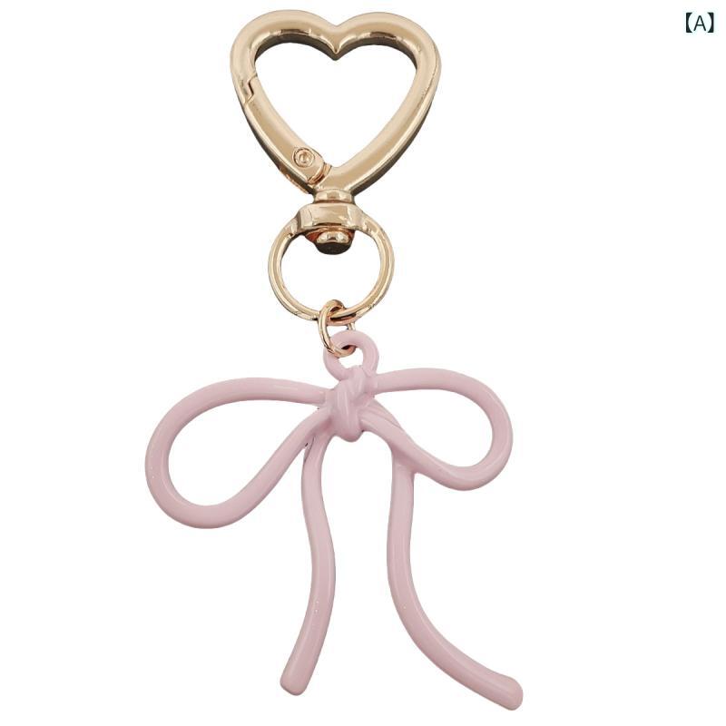 bloomelierのキーホルダー レディース ピンク リボン 蝶結び スマホストラップ バッグチャーム かわいい アクセサリー プレゼント｜アングル2