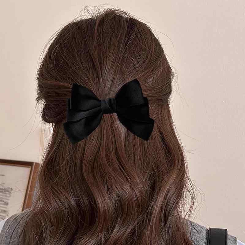 ・カテゴリ: ヘアアクセサリー・素材: 布・スタイル: 姫系、フェミニン・デザイン: リボンヘアクリップ・加工技術: 手法、ハンドメイド・ヘアクリップタイプ: ダッカールクリップ・カラー展開: ブラック、ベージュ・モチーフ: リボン・対象: レディース