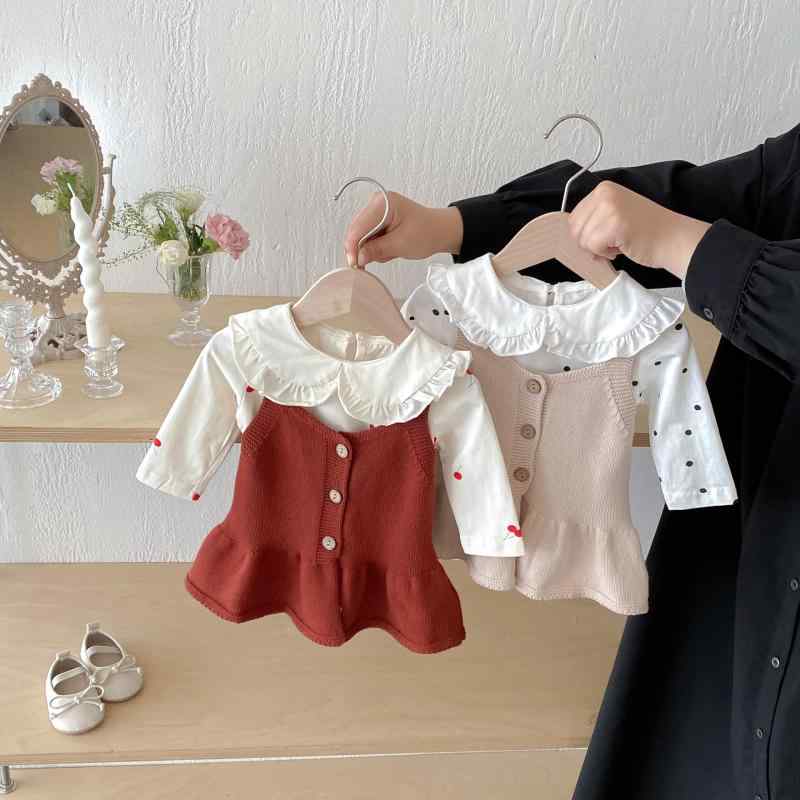 ・カテゴリ: 子供用ベスト・スタイル: シンプル・デザイン: ニットベスト、カーディガン・対象性別: 女性・対象年齢: ベビー・キッズ（1〜3歳、身長80〜100cm）・生地加工: 柔軟加工・柄: 無地・主な素材: 綿 95%・ネックライン: Vネック・フード: なし・カラー展開: オレンジ、アイボリー・サイズ展開: 66cm、73cm、80cm、90cm、100cm