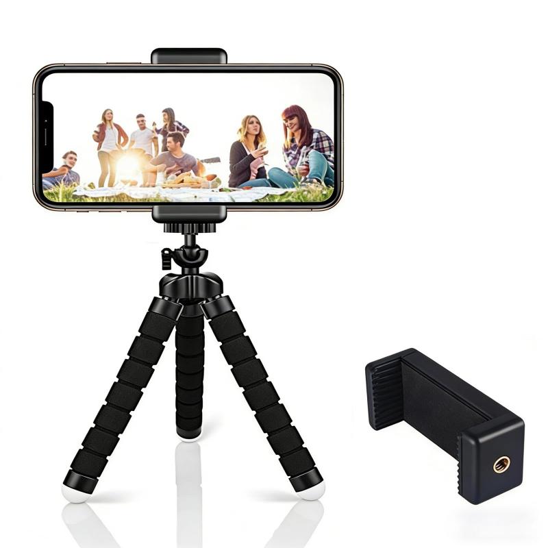 【Outop】 スマホ三脚 - ミニ三脚 スマホスタンド iPhone 用 カメラスタンド 超軽量 持ち運び便利高コスパの多機能性: このミニ三脚は、ビデオ撮影、セルフィー、ポートレート写真、Vlogなど、さまざまな撮影用途に適しています。スマートフォンや軽量なカメラを安定させ、日々の撮影を楽しく快適にします。広範な互換性: 1/4インチネジ付きで、GoProやアクションカメラ用アダプターも付属しており、スマートフォン、軽量カメラ、ウェブカメラ、プロジェクターなど様々なデバイスに対応可能です。柔軟かつ多目的なデザイン: 約18cmの長さで、デスクトップ三脚としてだけでなく、自撮り棒やハンドヘルドスタンドとしても使用できます。フェンスやポール、自転車のハンドルなどに巻きつけることもでき、通常の三脚では実現できないユニークな撮影角度が得られます。耐久性と携帯性: ステンレス鋼、ABS樹脂、フォーム素材を使用し、耐久性と軽量性を兼ね備えています。旅行やアウトドアでの撮影に最適で、どこへでも気軽に持ち運べます。写真・動画撮影に最適: スマートフォン、アクションカメラ、小型デジタルカメラなどを簡単に設置可能。動画撮影、ライブストリーミング、YouTubeやVlog制作にぴったりなアクセサリーです。