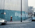 Boulevard is a visual tale of two disparate cities: Paris and Los Angeles. In the early 1970s Adam Bartos began to use color photography to document the contemporary urban landscape, infusing his images with a quiet calm and finding composition in even the most random corners.