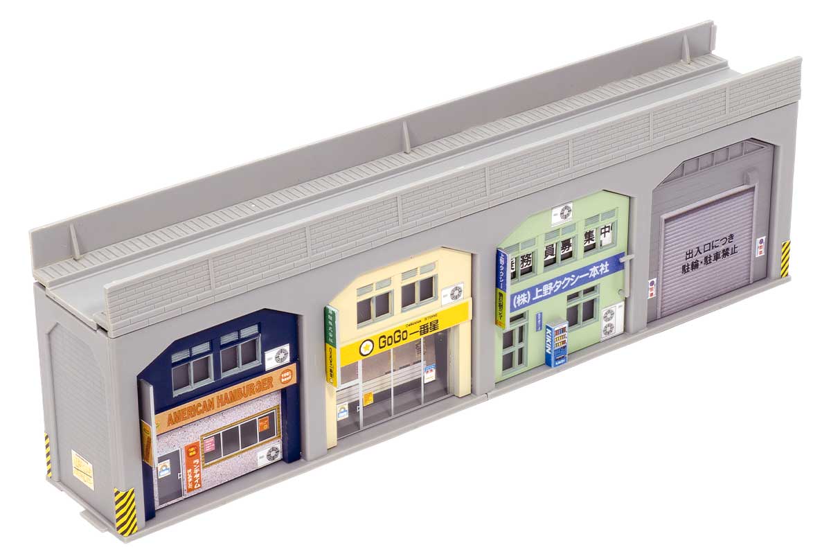 製品特徴	
■高架線区間の橋脚間に建築された倉庫・店舗を再現した着色済みストラクチャーキット
■本製品1セットで、単線高架下の倉庫・店舗4棟の1組を製作可能
■組立完成後のサイズ＝幅200mm×奥行34mm×高さ65mm
■成型色はグレー：高架プレート、橋脚、店舗・倉庫前面、壁
■倉庫・店舗正面の壁面、窓枠などは印刷済み
■倉庫正面のシャッターは印刷で再現
■ステッカー2枚（新版＋既存）と印刷付塩ビ板、窓用塩ビ板付属
■ステッカーは高架下の倉庫、店舗でよく見られるような表示、看板、貼り紙などを多数収録
■複数セットを横に並べると複線高架下の倉庫・店舗の製作も可能
■倉庫・店舗を組込まず、高架橋のみで組み立てることも可能

※模型化にあたり実物と異なる場合がございます。予めご了承ください。

製品内容
・橋脚
・土台
・正面（印刷付き）
・床
・壁
・ツメ
・印刷済みガラス
・板ガラス
・ステッカー1（既存）※＜2143＞高架下の倉庫・店舗と同様
・ステッカー2（新規）
・組立説明書

・ホビー系商品についての諸注意
メーカー都合により発売の大幅な延期が発生する可能性がございます。
予約商品についてはメーカーから順次入荷次第の発送となります。メーカー公表の発売日とは異なる場合がございますのでご了承ください。【対象年齢】：15歳以上