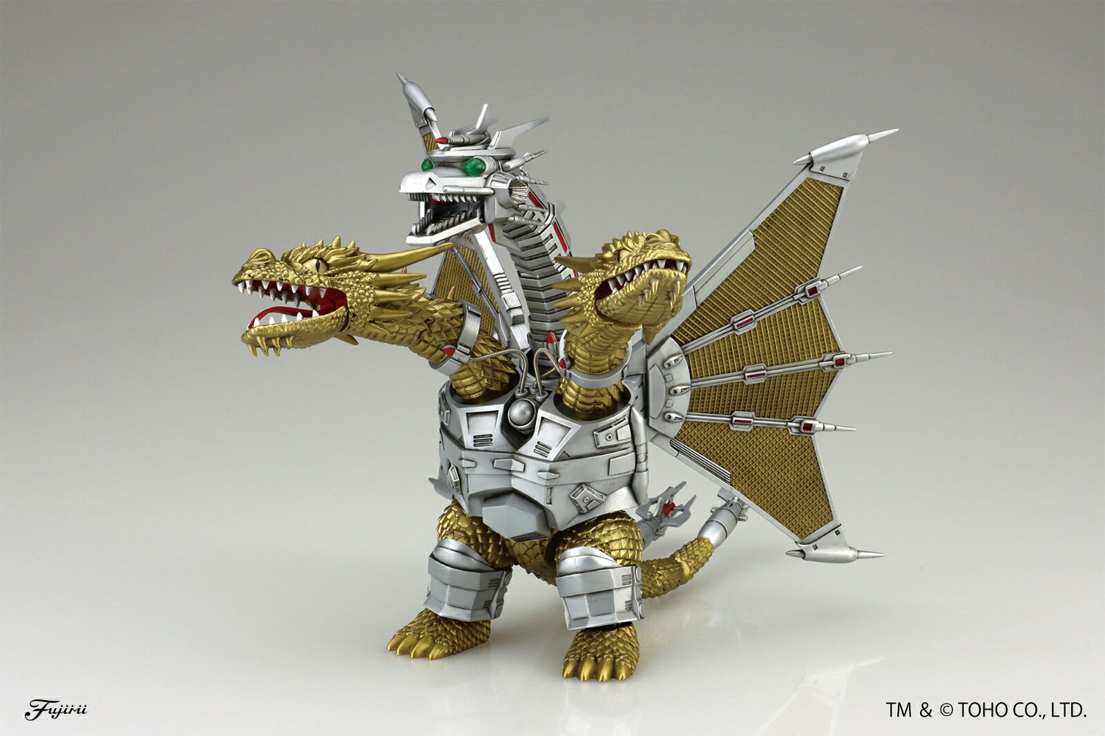 世紀末・最大の戦いが再現できる！
メカキングギドラが通常仕様で登場！

・チビマルゴジラシリーズは、歴代の映画ゴジラに登場しているキャラクターを可愛くデフォルメしたラインナップ。
・組立はプラキットの経験がなくても安心してできるカンタン仕様。
・タッチゲート式の設計で、ニッパーがなくとも、手でパーツをランナーから取り出せます。
・パーツは、あらかじめイメージにあった着色が施されており塗装する必要はありません。
・細部の彩色やデザイン模様は、付属のカット済みシールを貼るだけ。
・完成後のサイズは大人の手のひらの乗るくらいで、コレクションにも適した大きさです。

・2025年4月に70周年バージョンとして発売したメカキングギドラの通常仕様。
・製品は1991年公開映画『ゴジラVSキングギドラ』で登場したメカキングギドラがモチーフ。
・接着剤不要、塗装不要としたスナップフィット仕様。

全27ランナー、179パーツとチビマルゴジラシリーズではボリュームある内容。
・スケールはノンスケールでデフォルメモデルながらメカキングギドラの特徴的部分をよく再現しています。
・完成時サイズ:(約)160×200＊×220mm(＊幅200mmは翼を最大展開した時)

●製品は頭部・胴体・翼・脚部・尾とそれぞれの部分で可動箇所を設け、自由度の高いポーズが可能。
・頭部（下顎と舌）はボールジョイントで可動し、動きに制約が少なくポーズがつけやすくしています。
・左右オリジナルの首は3箇所の可動点があり、いずれもボールジョイントで自由に動かせます。
・中央メカ化された首は可動点が6点と多く設定しています。
・脚部は可動を2箇所、尾は4箇所の可動点を設けています。

●形状は特徴的な部分をデフォルメしつつリアルさも感じられる表現。
・中央の頭部は、左右のシャープなアンテナ状造形や口腔内の牙など細やかな造形表現で設計。
・口腔内（上顎/口蓋）のレーザー光線砲は別パーツ化し目立つ姿としています。
・メカ頭部の眼球はクリアーグリーンで専用色のカラーパーツを用意、輝いているような色調です。
・オリジナルの眼球はカット済みのシールで表現、色調とパターンは3種から選択できます。
・オリジナルの顔は角やウロコ状の表面を立体的に再現、組立てを考慮し角から鼻先まで1パーツ化。

・胴体はゴジラ捕獲用のマシンハンドを格納した大型装甲胴体を専用パーツで用意。
・組み立てやすさを考慮して胴体主部分は前後と背の3パーツで設計。
・胴体上部にはタイムマシンKIDを改造したコクピットパーツがあり、別パーツで用意しています。

・コクピットから動作命令を伝える神経導線は金属色のスプリングパイプパーツを専用に同梱。
・首の動きに追従してフレキシブルに導線も動きます。
・導線パーツが接続されるチョーカー（首輪）と胴体側受け部も用意。
・左右のオリジナルの首もチョーカーに対応する専用部品としています。

・脚部は脛の装甲化された部分を専用品でパーツ化。
・マシンハンドの装備により、オリジナル形状の下半身も専用対応パーツを起用しています。
・足裏は飛行状態でも見えた場合のリアルさを追求し、皮膚上の凹凸あるパーツ規専用で用意。

●パーツのカラーは「ゴールド・シルバー・ホワイト・レッド・クリアグリーン」の5色
・パーツはアンダータッチゲート式の設計で、ニッパーがなくても手でランナーから外すことができます。
（・アンダータッチゲートを採用しているため、輸送時等の衝撃で、やむを得ずパーツがランナーから離れている場合が稀にありますのでご了承ください）

●オリジナルの眼球や口腔内、メカの首や翼の細かい彩色部分は付属シールで再現。
・付属シールは切抜き済みで、追従性のよい素材で簡単の貼付できるようにしています。
・付属シールはオリジナル部分の彩色用と、メカ部分の彩色用の計2種が付属します。

【付属内容】　ランナー×27　・スプリングパイプパーツ×3　・シール×2 ・組立説明書×1

※モニターや画像解像度の問題により、色の見え方が実際の商品と異なることが御座いますので、予めご了承ください。商品は新品・未開封です。

・ホビー系商品についての諸注意
メーカー都合により発売の大幅な延期が発生する可能性がございます。
予約商品についてはメーカーから順次入荷次第の発送となります。メーカー公表の発売日とは異なる場合がございますのでご了承ください。【対象年齢】：